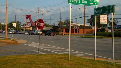 The intersection of Frey’s Gin Road meets Roswell Road in Cobb County has seen some history, some of it dark. Photo: Jennifer Brett/jbrett@ajc.com