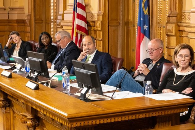 Board member Sara Tindall Ghazal, member Janelle King, executive director Mike Coan, chairman John Fervier, member Rick Jeffares and member Janice Johnston listen during the Georgia Election Board meeting Monday in Atlanta. (Arvin Temkar / AJC)