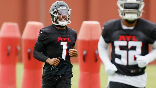 Falcons cornerback Jeff Okudah (1) jogs as he warms up Wednesday, June 14, 2023, in Flowery Branch, Ga.

 Miguel Martinez / miguel.martinezjimenez@ajc.com