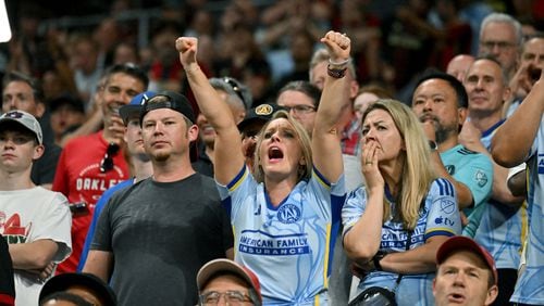 Atlanta United fans react during the second half in a MLS soccer match at Mercedes-Benz Stadium, Saturday, May 25, 2024, in Atlanta. Los Angeles FC won 1-0 over Atlanta United. (Hyosub Shin / AJC)