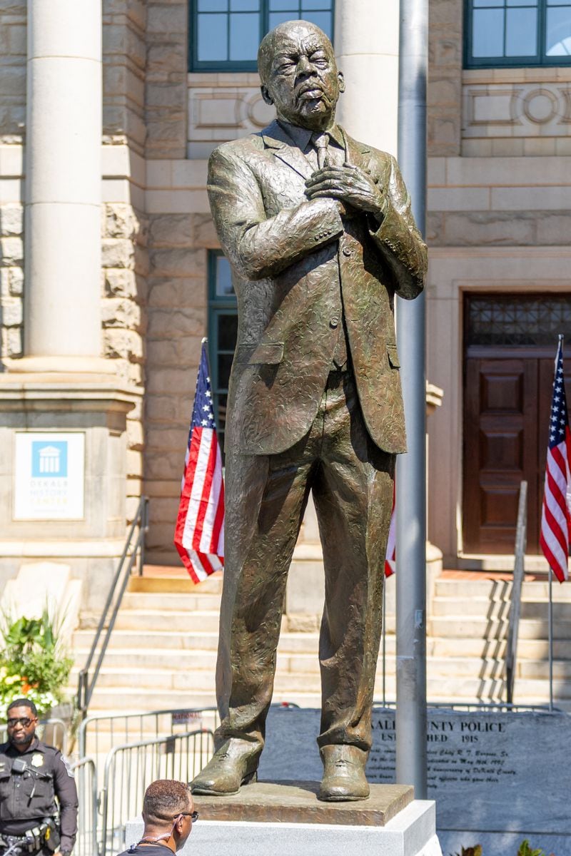 The statue of the late Congressman John Lewis stands in Decatur after the unveiling ceremony on Saturday, Aug 24, 2024.  (Steve Schaefer / AJC)