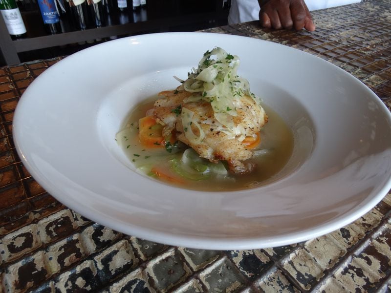 T's grouper in fennel broth and seasonal vegetables available at Three Blind Mice. CREDIT: Rodney Ho/rho@ajc.com