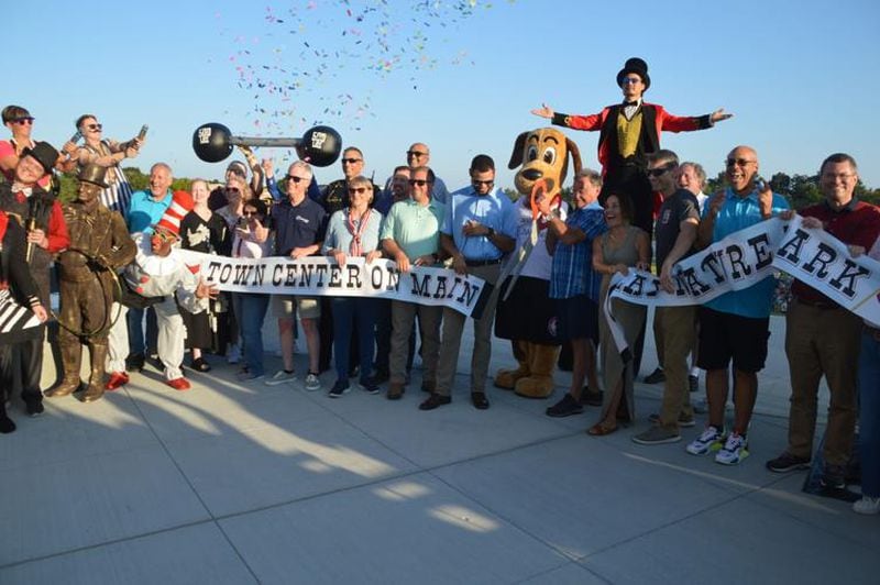 Suwanee leaders cut the ribbon to officially open the city's new Town Center on Main and DeLay Nature Park on August 24, 2024. (Photo Courtesy of Curt Yeomans)