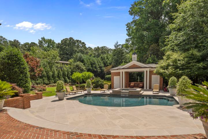 Over 1.5 acres of lush landscapes bring the low country to East Cobb