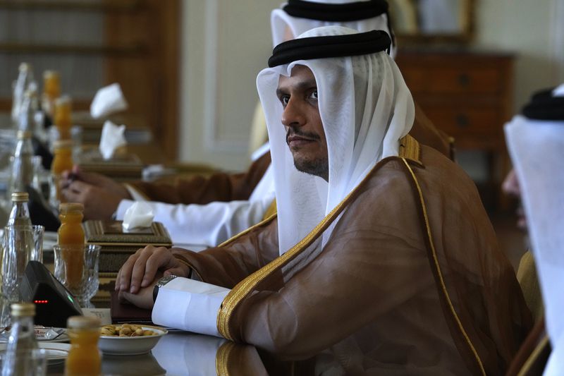 Qatari Prime Minister and Foreign Minister Sheikh Mohammed bin Abdulrahman Al Thani attends a meeting with Iranian Foreign Minister Abbas Araghchi, in Tehran, Iran, Monday, Aug. 26, 2024. (AP Photo/Vahid Salemi)