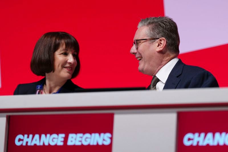 Britain's Prime Minister Keir Starmer and Chancellor of the Exchequer Rachel Reeves attend the Labour Party Conference in Liverpool, England, Sunday Sept. 22, 2024. (Peter Byrne/PA via AP)