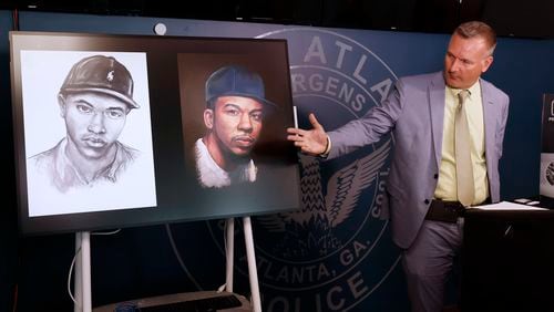 APD detective Scott Demeester shows the recent new sketch with more detail than the one made ten years ago. With this, APD hopes to find leads on the ten-year-old case of the murder of Patrick Cotrona. Thursday, May 25, 2023. 

Miguel Martinez /miguel.martinezjimenez@ajc.com