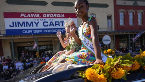 A float moves down main street during the 26th annual Plains Peanut Festival, ahead of former President Jimmy Carter's birthday on Oct. 1, Saturday, Sept. 28, 2024, in Plains, Ga. Carter didn't attend the festival. (AP Photo/Mike Stewart)