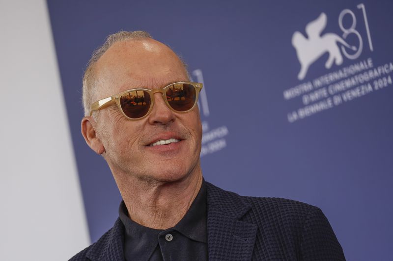 Michael Keaton poses for photographers at the photo call for the film 'Beetlejuice Beetlejuice' during the 81st edition of the Venice Film Festival in Venice, Italy, on Wednesday, Aug. 28, 2024. (Photo by Joel C Ryan/Invision/AP)