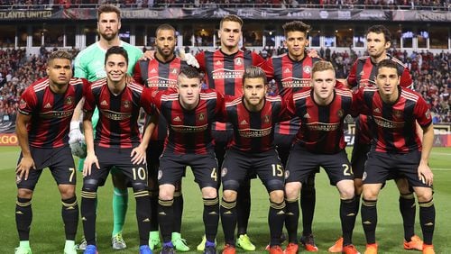 Atlanta United FC gather for a team photo before taking on the New York Red Bulls during their first game in franchise history on Sunday, March 5, 2017, in Atlanta. Curtis Compton/ccompton@ajc.com