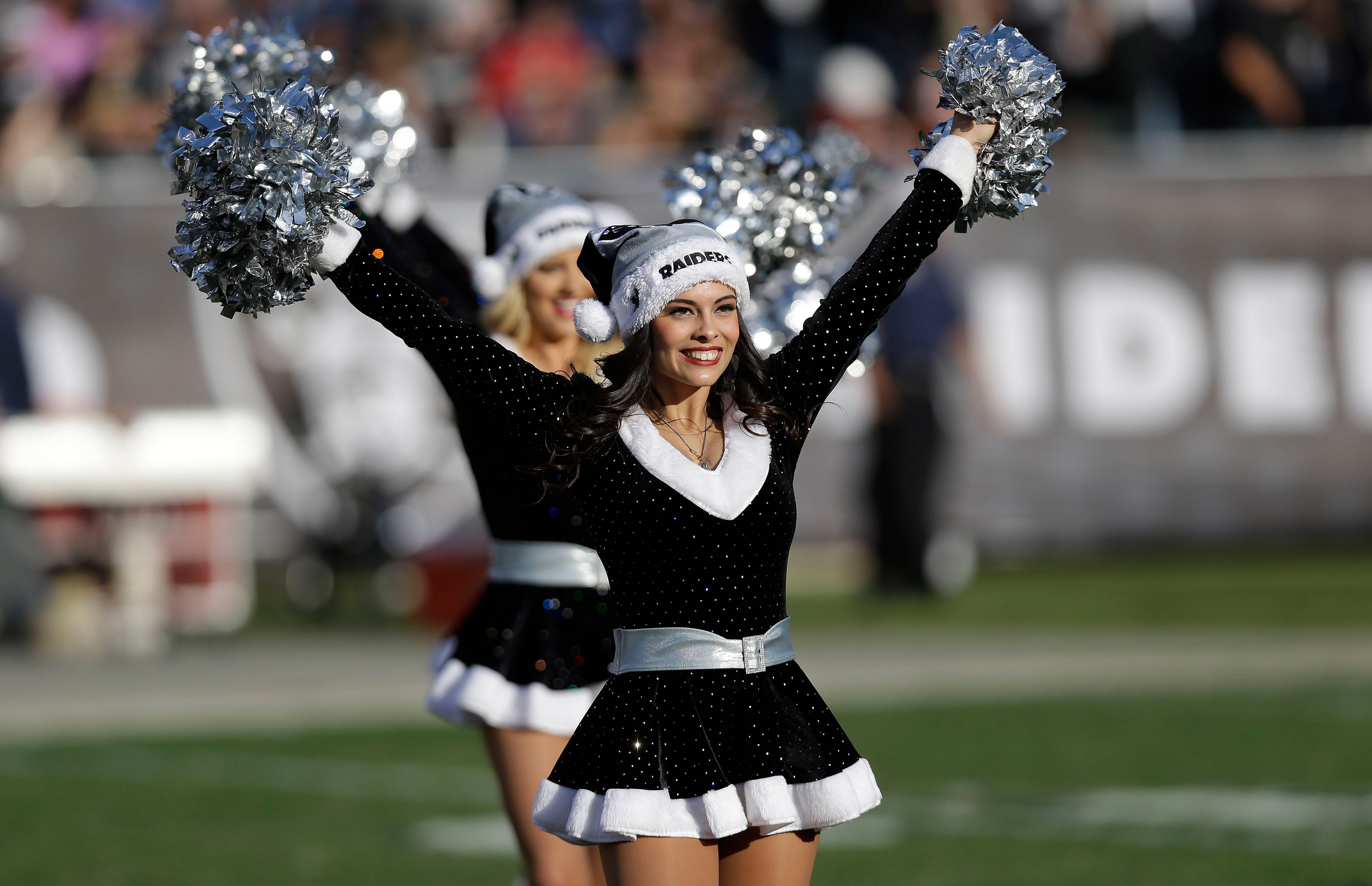 Photos: NFL, NBA cheerleaders get ready for Christmas