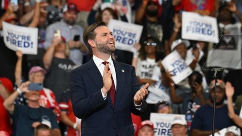 Vice-Presidential candidate JD Vance reacts during a rally at the Georgia State University’s convocation center on Saturday, August 3, 2024 in Atlanta. Former President Donald Trump and Vice-Presidential candidate JD Vance are holding their first rally together in Georgia on Saturday at the same place – the GSU Convocation Center- Kamala Harris held hers earlier this week.  (Hyosub Shin / AJC)