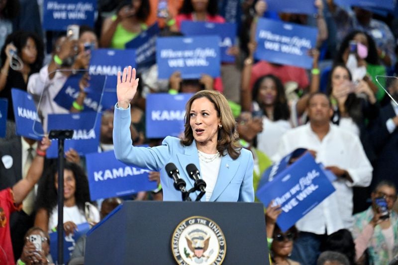 Vice President Kamala Harris waves to the crowd during her July rally at Georgia State University.