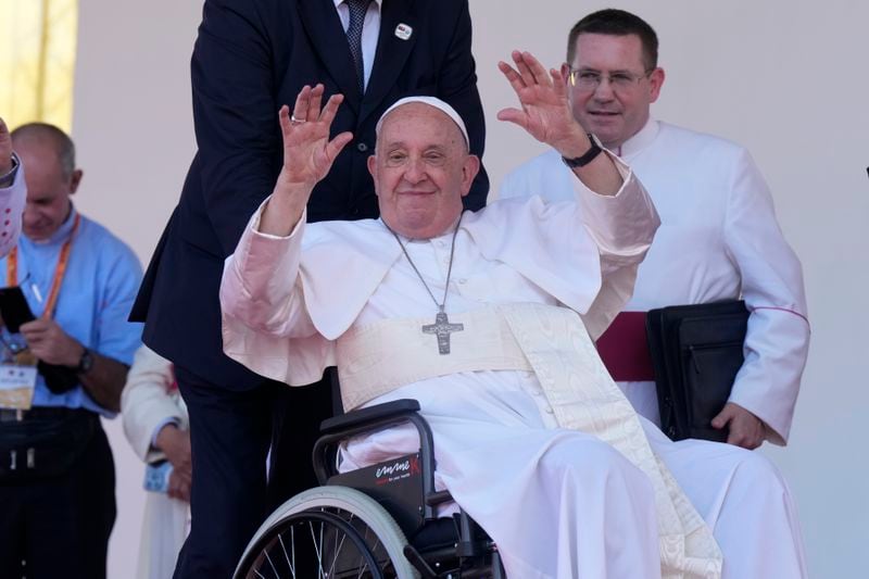 Pope Francis waves after giving an address during meeting with young people in the Sir John Guise Stadium in Port Moresby, Papua New Guinea, Monday, Sept. 9, 2024. (AP Photo/Mark Baker)