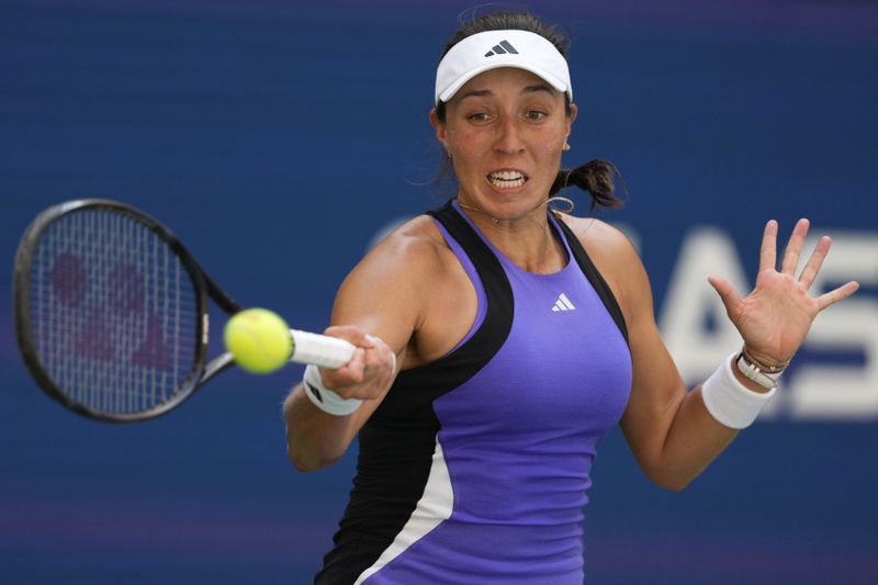 Jessica Pegula, of the United States, returns a shot during a match against Daria Snigur, of Ukraine, in the fourth round of the U.S. Open tennis championships, Monday, Sept. 2, 2024, in New York. (AP Photo/Kirsty Wigglesworth)