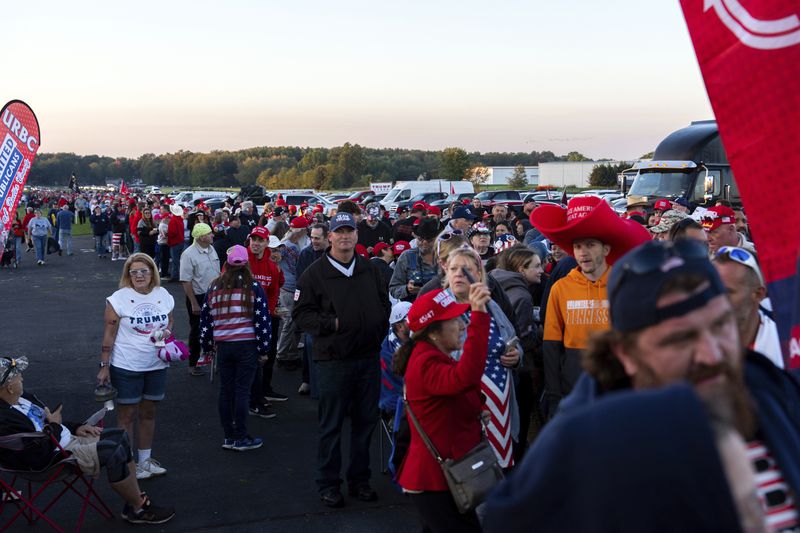 Supporters of Republican presidential nominee former President Donald Trump wait to enter a campaign rally at the Butler Farm Show, Saturday, Oct. 5, 2024, in Butler, Pa. (AP Photo/Julia Demaree Nikhinson)