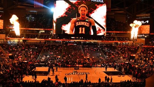 Hawks players are introduced as the hardwood court is specially decorated with the Peach emblem before their game against the Philadelphia 76ers at State Farm Arena on Thursday, November 10, 2022. (Hyosub Shin / Hyosub.Shin@ajc.com)