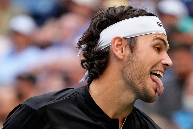 Taylor Fritz, of the United States, reacts in a tiebreaker against Alexander Zverev, of Germany, during the quarterfinals of the U.S. Open tennis championships, Tuesday, Sept. 3, 2024, in New York. (AP Photo/Kirsty Wigglesworth)