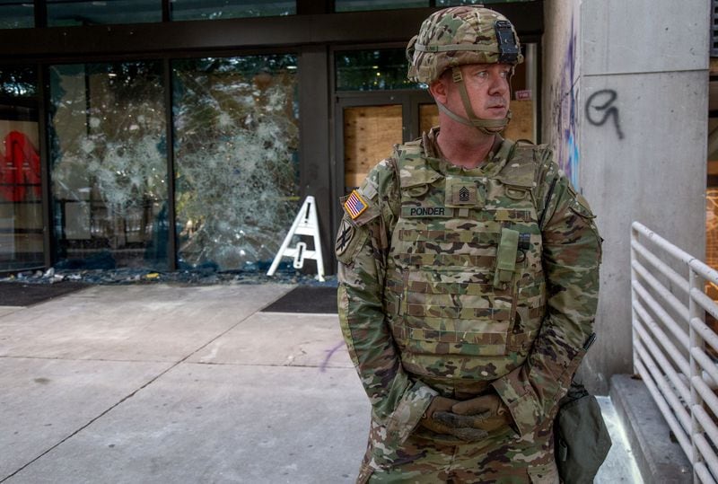 The Georgia National Guard stands guard near the CNN center after the George Floyd protest Saturday, May 30, 2020. STEVE SCHAEFER FOR THE ATLANTA JOURNAL-CONSTITUTION