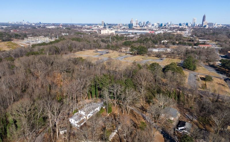 An aerial photograph shows the Grove Park neighborhood and some of the land that is set to become a new Microsoft campus. (Hyosub Shin / Hyosub.Shin@ajc.com)