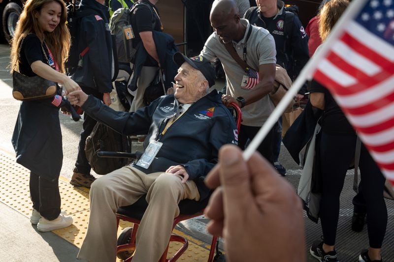 World War II veteran Andy Negra Jr. of Helen arrives for a Delta charter flight to Normandy at the Hartsfield-Jackson international terminal in Atlanta on Sunday, June 2, 2024. Delta and Best Defense Foundation flew more than 40 WWII veterans to Normandy to commemorate the 80th anniversary of D-Day. (Arvin Temkar / AJC)