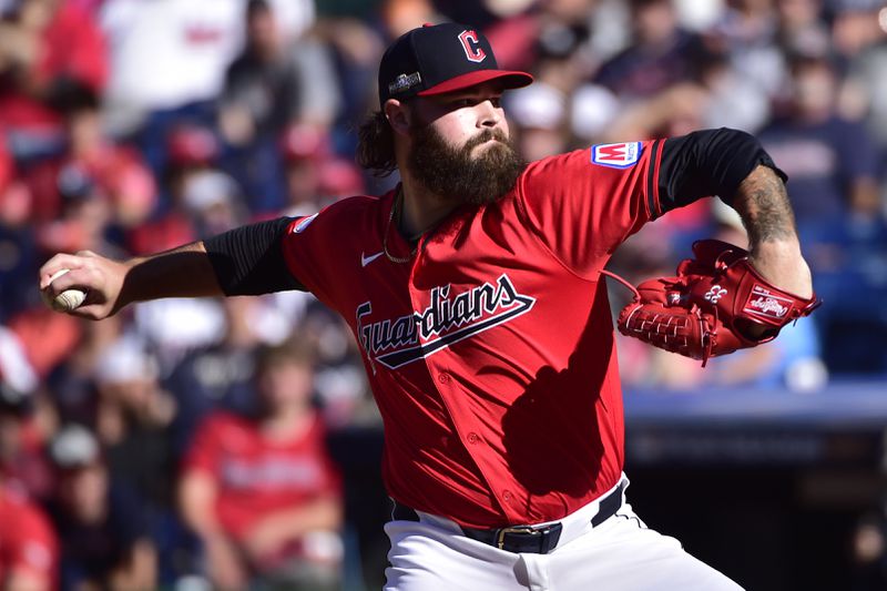 Cleveland Guardians' Hunter Gaddis pitches in the eighth inning during Game 1 of baseball's AL Division Series against the Detroit Tigers, Saturday, Oct. 5, 2024, in Cleveland. (AP Photo/Phil Long)