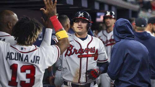 Braves’ Austin Riley celebrates his solo home run with Ronald Acuna (13) during the sixth inning against the Miami Marlins at Truist Park, Monday, April 24, 2023, in Atlanta. The Braves won 11-0. Jason Getz / Jason.Getz@ajc.com)