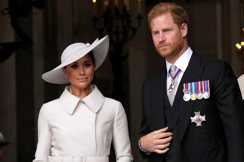 FILE - Prince Harry and Meghan Markle, Duke and Duchess of Sussex leave after a service of thanksgiving for the reign of Queen Elizabeth II at St Paul's Cathedral in London, Friday, June 3, 2022 on the second of four days of celebrations to mark the Platinum Jubilee. (AP Photo/Matt Dunham, Pool, File)