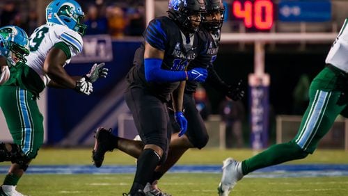 Memphis defensive lineman Morris Joseph (foreground) announced his decision to transfer to Georgia Tech. He is pictured playing for Memphis against Tulane on Nov. 27. (University of Memphis Athletics)