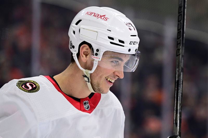 FILE - Ottawa Senators' Shane Pinto reacts during an NHL hockey game against the Philadelphia Flyers, Jan. 21, 2024, in Philadelphia. (AP Photo/Derik Hamilton, File)