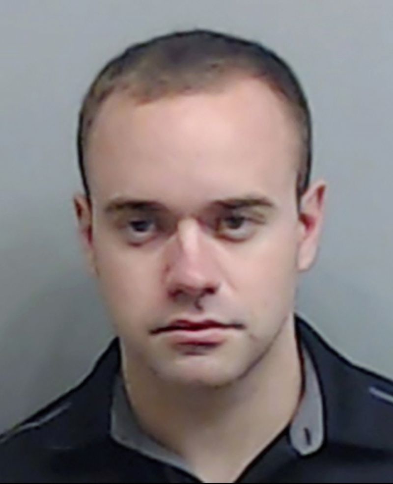 FILE -- In this booking file photo made available Thursday, June 18, 2020, by the Fulton County Sheriff's Office, is Garrett Rolfe. Rolfe, the Atlanta Police officer who was fired from his job after fatally shooting a Black man, Rayshard Brooks, was reinstated Wednesday, May 5, 2021 by the city’s Civil Service Board, which found that Rolfe’s firing violated his due process rights. (Fulton County Sheriff's Office via The New York Times) -- FOR EDITORIAL USE ONLY. --