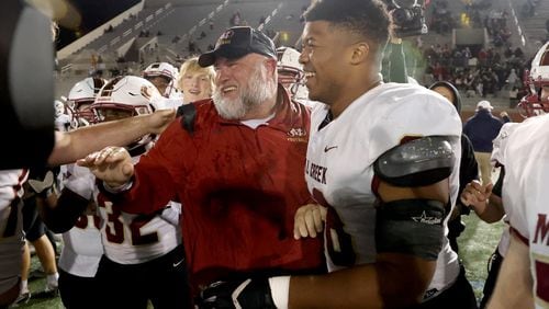 After leading Mill Creek to a Class 7A state title last season, head coach Josh Lovelady is looking to put together another successful run in 2023. Jason Getz / Jason.Getz@ajc.com)