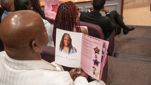 A third teenager was arrested Tuesday in the killing of Bre’Asia Powell, police said. Powell, whose photo is shown in a program for her funeral, was shot May 28 during an unauthorized gathering at Benjamin E. Mays High School.
