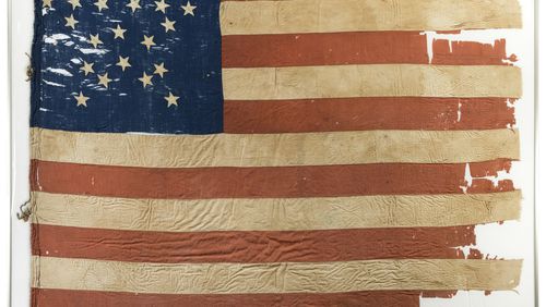 This image provided by Heritage Auctions, shows 21-star U.S. flag. Illinois state investigators are scrutinizing the purchase by the Abraham Lincoln Presidential Library and Museum of this 21-star U.S. flag reportedly from 1818-1819 at the time that Illinois was admitted to the Union as the 21st state. At the same time, one of the nation's top vexillologists, or flag experts, says the flag is not from 1818 but from the Civil War period and is likely a so-called Southern exclusionary flag, reserving on its blue canton space for stars representing only those states remaining loyal to the Union. (Heritage Auctions via AP)