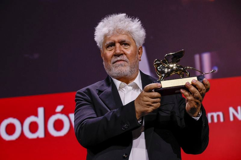 Pedro Almodovar, winner of the golden lion for best film for 'The Room Next Door', poses for photographers during the awards ceremony of the 81st edition of the Venice Film Festival in Venice, Italy, on Saturday, Sept. 7, 2024. (Photo by Joel C Ryan/Invision/AP)