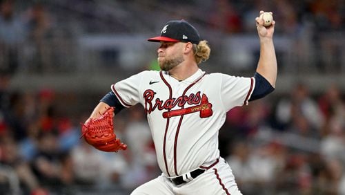 Atlanta Braves' relief pitcher A.J. Minter (33) throws a pitch against the St. Louis Cardinals during the eighth innning at Truist Park, Thursday, September 7, 2023, in Atlanta. Atlanta Braves won 8-5 over St. Louis Cardinals. (Hyosub Shin / Hyosub.Shin@ajc.com)