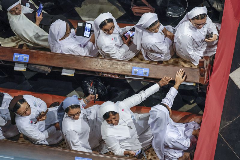 Nuns wait for the arrival of Pope Francis at the Jakarta Cathedral in Jakarta, Indonesia, Wednesday, Sept. 4, 2024. (Yasuyoshi Chiba /Pool Photo via AP)