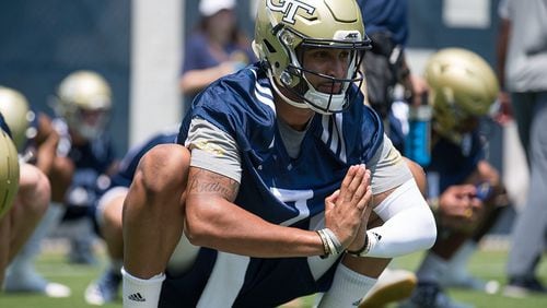 Georgia Tech quarterback Lucas Johnson (7) stretch during a preseason football practice at Alexander Rose Bowl Field on Wednesday, July 31, 2019. (Alyssa Pointer/alyssa.pointer@ajc.com)