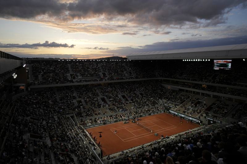 A view of the center court Philippe Chatrier as Britain's Andy Murray, left, serves against Switzerland's Stan Wawrinka during their first round match of the French Open tennis tournament at the Roland Garros stadium in Paris, Sunday, May 26, 2024. (AP Photo/Thibault Camus)
