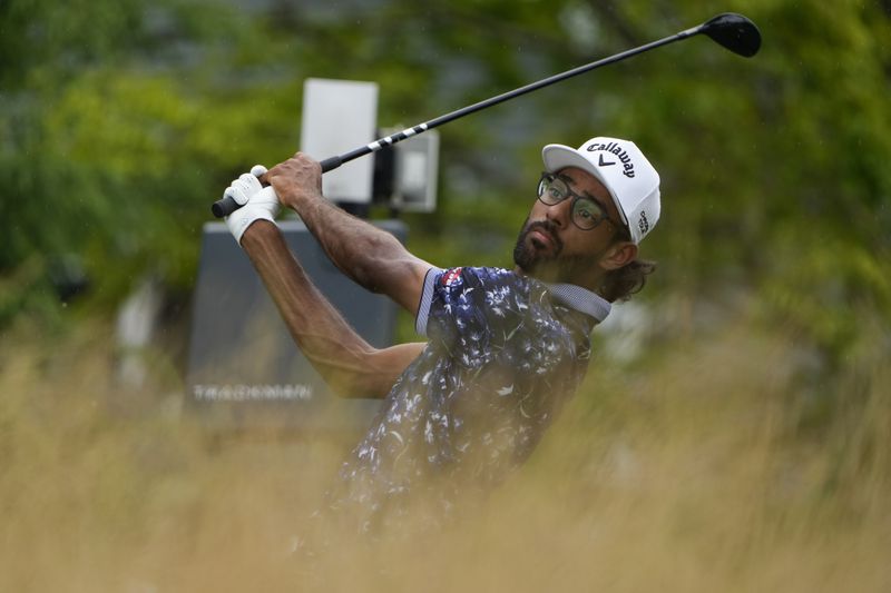 Akshay Bhatia hits from the 17th tee during the second round of the Travelers Championship golf tournament at TPC River Highlands, Friday, June 21, 2024, in Cromwell, Conn. (AP Photo/Seth Wenig)