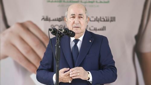 Algerian president and candidate for re-election Abdelmajid Tebboune speaks after casting his ballot inside a polling station during the presidential elections, Saturday, Sept. 7, 2024, in Algiers, Algeria. (AP Photo)