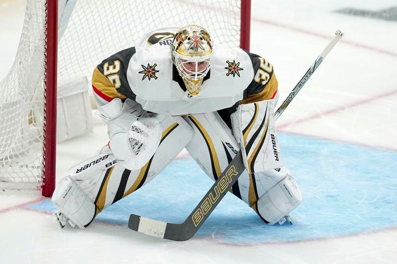 FILE - Vegas Golden Knights goaltender Logan Thompson defends his net against the Dallas Stars during the third period in Game 2 of an NHL hockey Stanley Cup first-round playoff series in Dallas, Wednesday, April 24, 2024. The Washington Capitals acquired goaltender Logan Thompson from Vegas and sent fourth-line winger Beck Malenstyn to Buffalo. (AP Photo/Tony Gutierrez, File)