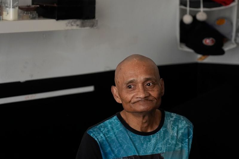 David Labogin is interviewed in his Five Keys transitional housing room in San Francisco, Monday, Aug. 26, 2024. (AP Photo/Jeff Chiu)