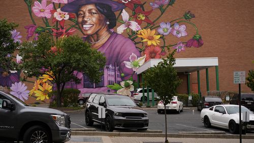 A mural depicting Hattie Moseley, a Springfield civil rights activist who was instrumental in battling the segregation of Fulton Elementary School, on the WesBanco building on East Main Street in Springfield, Ohio, on Sept. 17. (Carolyn Kaster/AP)