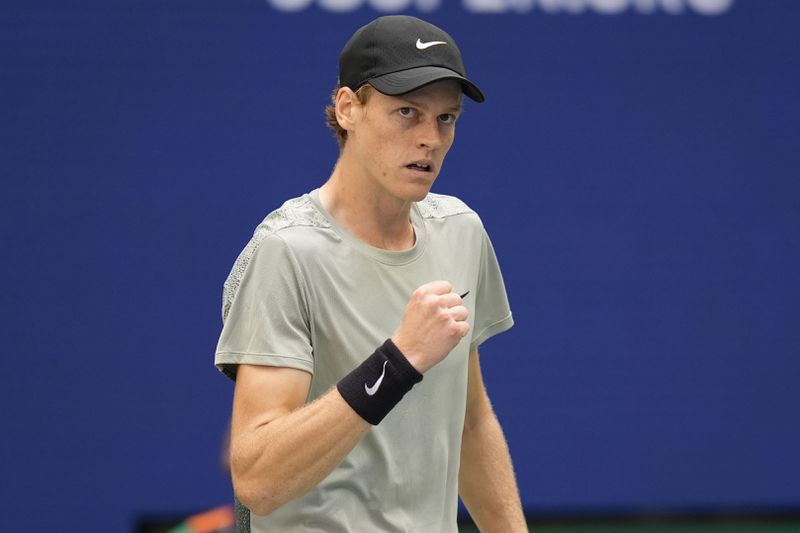 Jannik Sinner, of Italy, reacts after scoring a point against Taylor Fritz, of the United States, during the men's singles final of the U.S. Open tennis championships, Sunday, Sept. 8, in New York. 2024. (AP Photo/Seth Wenig)