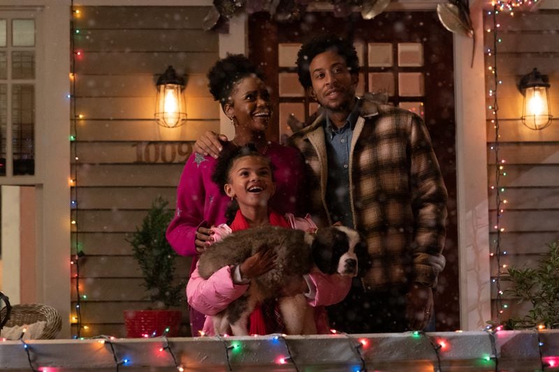 (L-R): Teyonah Parris as Allison, Madison Skye Validum as Charlotte, and Chris 'Ludacris' Bridges as Eddie in DASHING THROUGH THE SNOW, exclusively on Disney+. Photo by Steve Dietl. © 2023 Disney Enterprises, In.c All Rights Reserved.