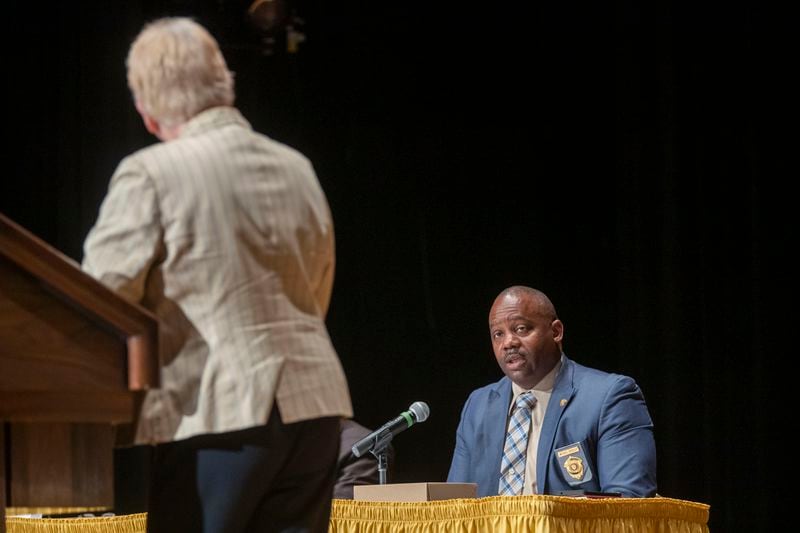 Albany Police Chief Michael J. Persley, right, answers a direct question from City Ward 3 Commissioner BJ Fletcher, left, during a community conversation about gun violence at the Albany Municipal Auditorium in Albany, Sept. 2, 2021.  (Alyssa Pointer/Atlanta Journal-Constitution)