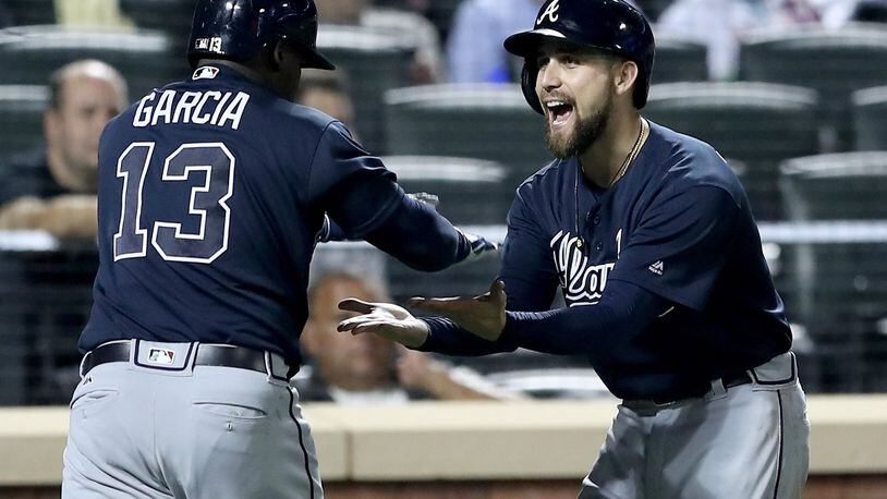 Mets' new additions erupt for three homers in win over Braves