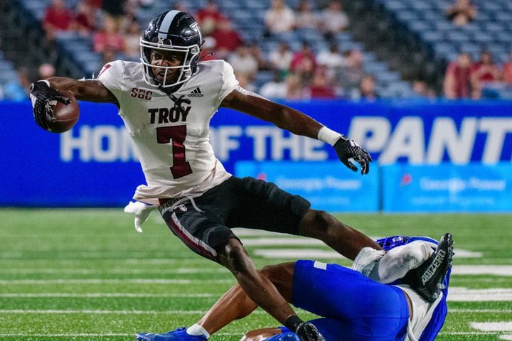 Troy's Reggie Bracy gets tackled against Georgia State Saturday, Sept. 30, 2023 (Jamie Spaar for the Atlanta Journal Constitution)