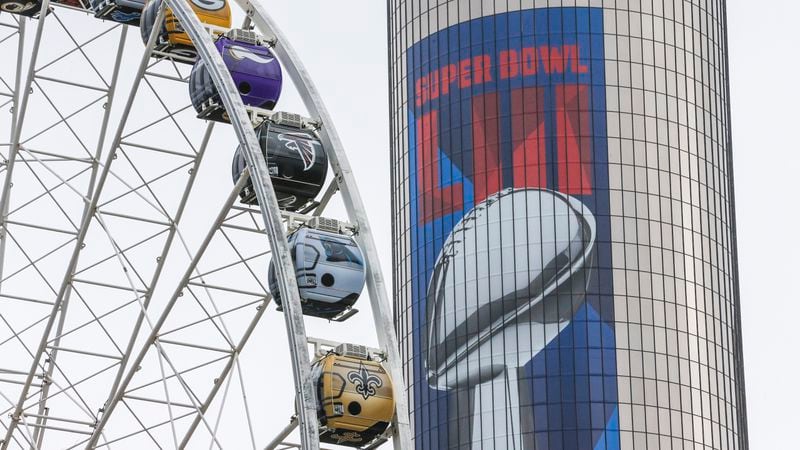 From buildings to transportation and even Skyview Atlanta downtown, it seems like everything has Super Bowl graphics. (John Spink/jspink@ajc.com)